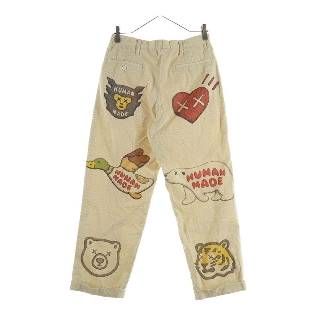 HUMAN MADE(ヒューマンメイド) ×KAWS CORDUROY PRINT PANTS カウズ ロゴプリント コーデュロイパンツ ベージュ