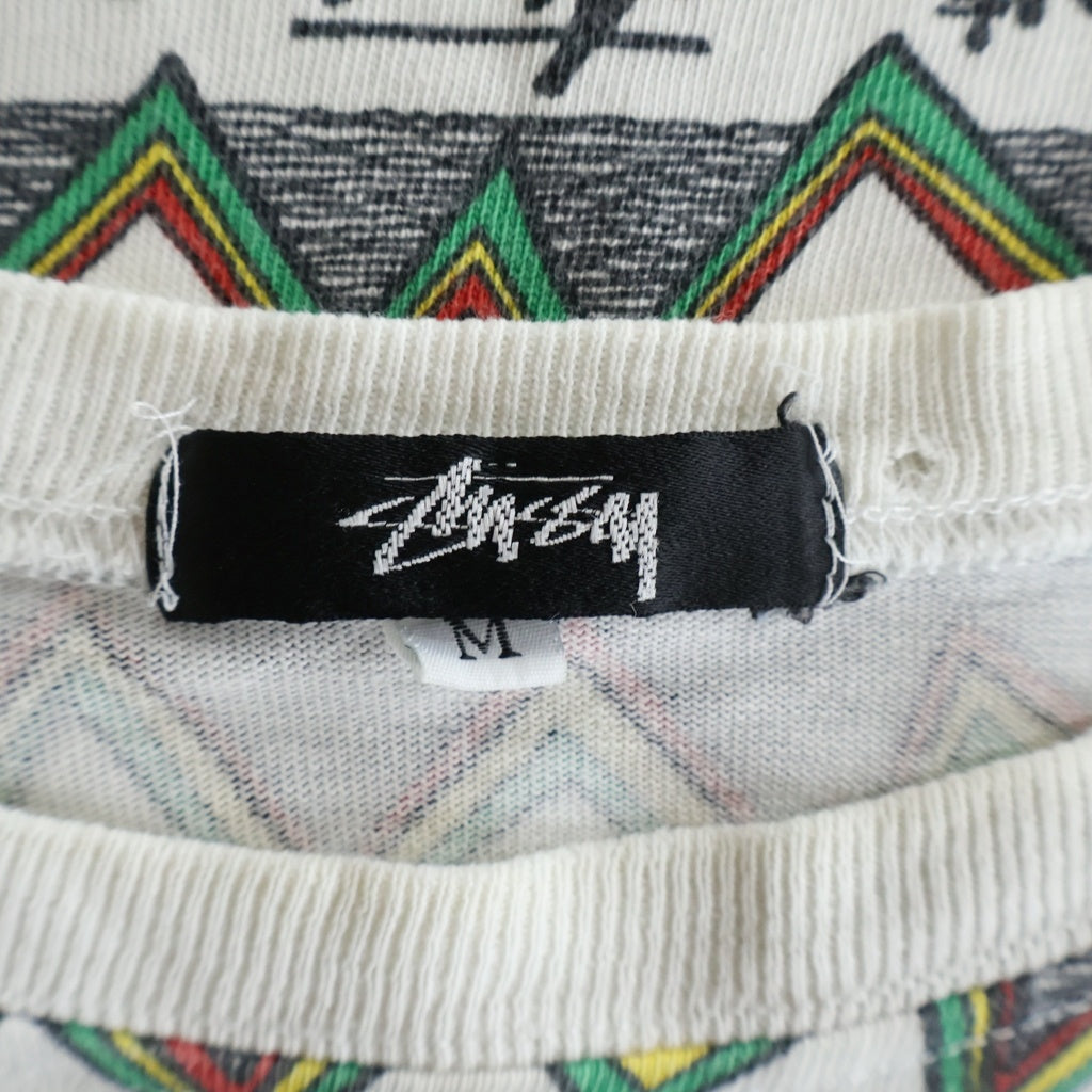 STUSSY(ステューシー) 80S OLD REGGAE TOMTOM オールド レゲエ トムトム 総柄半袖Tシャツ カットソー ホワイト