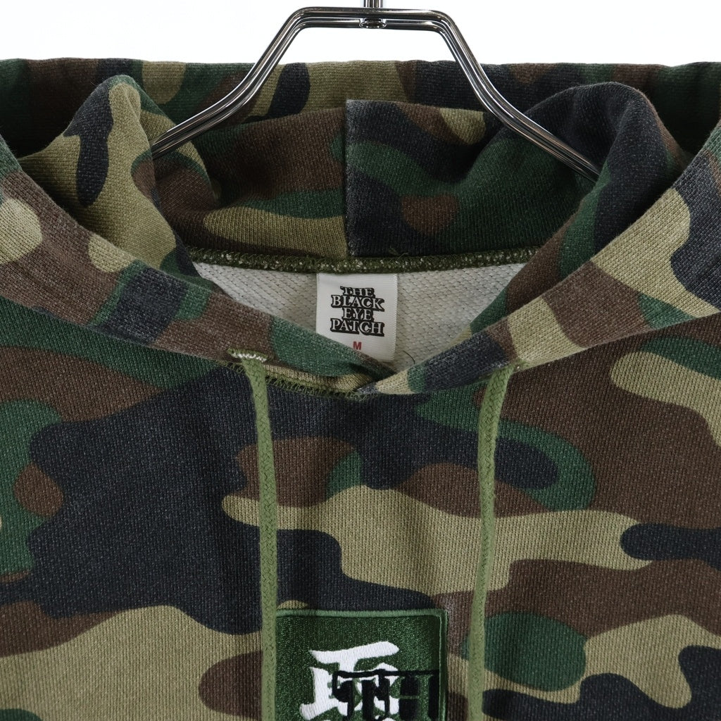 THE BLACK EYE PATCH(ブラックアイパッチ) Camouflage HWC Label Hoodie カモフラージュ総柄 フロント取扱注意ロゴ 刺繍 プルオーバー パーカーフーディー カーキ