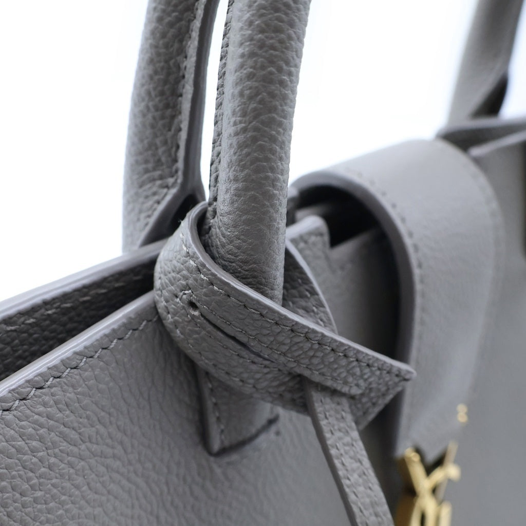 YVES SAINT LAURENT(イヴサンローラン) ダウンタウン ベイビーカバス レザー カサンドラロゴ ハンドバッグ グレージュ ゴールド金具 635346 レディース