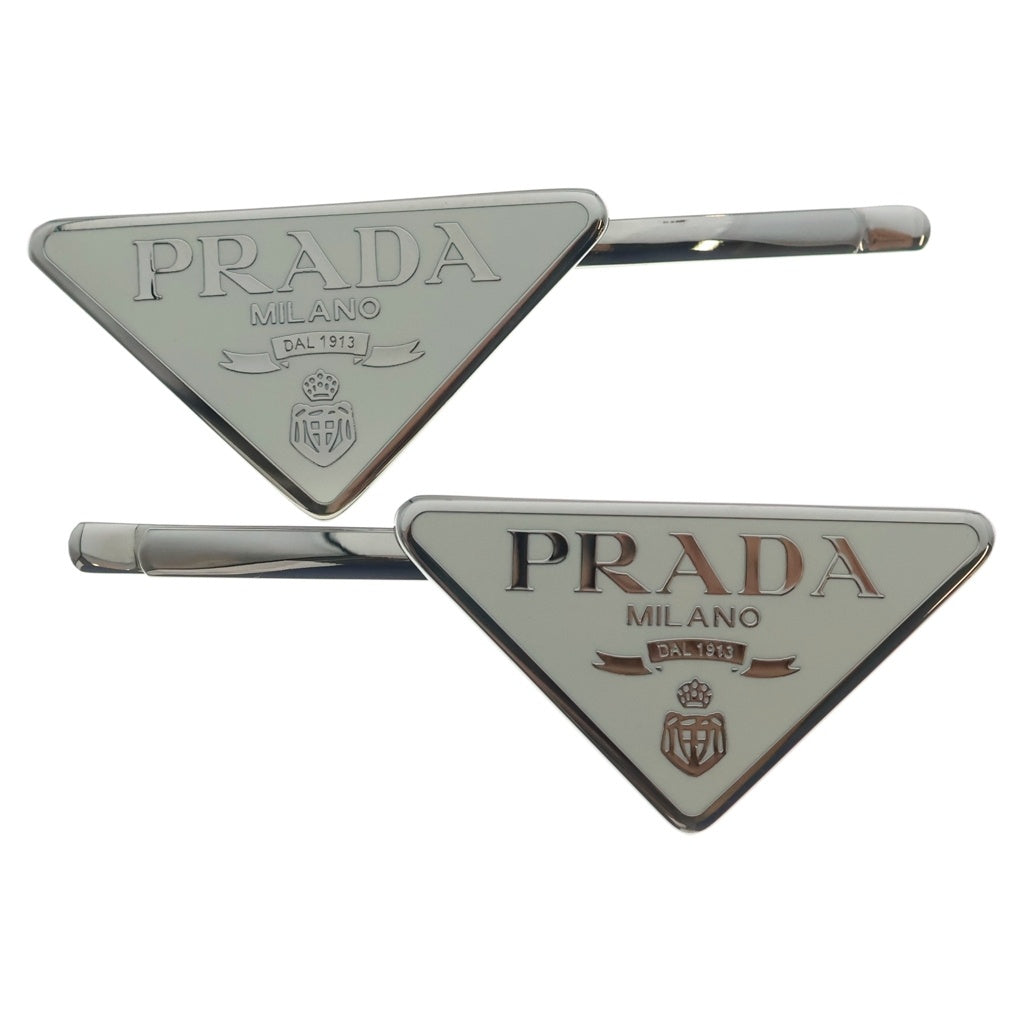 PRADA(プラダ) トライアングルロゴ ヘアクリップ ヘアピン ホワイト×シルバー レディース