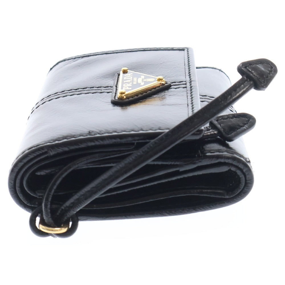 PRADA(プラダ) ソフトルックス ロゴトライアングルプレート コンパクトウォレット ブラック 三つ折り財布