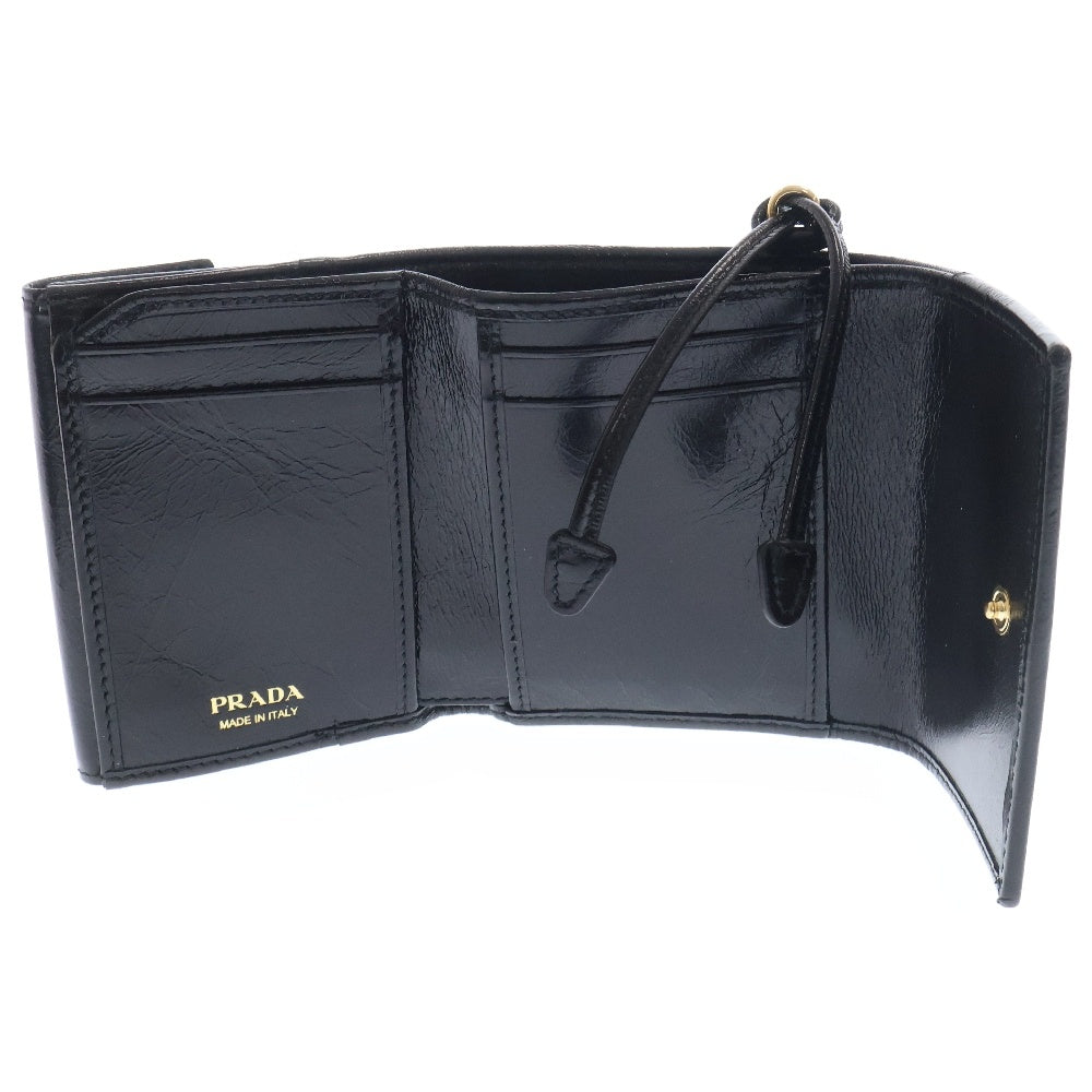 PRADA(プラダ) ソフトルックス ロゴトライアングルプレート コンパクトウォレット ブラック 三つ折り財布