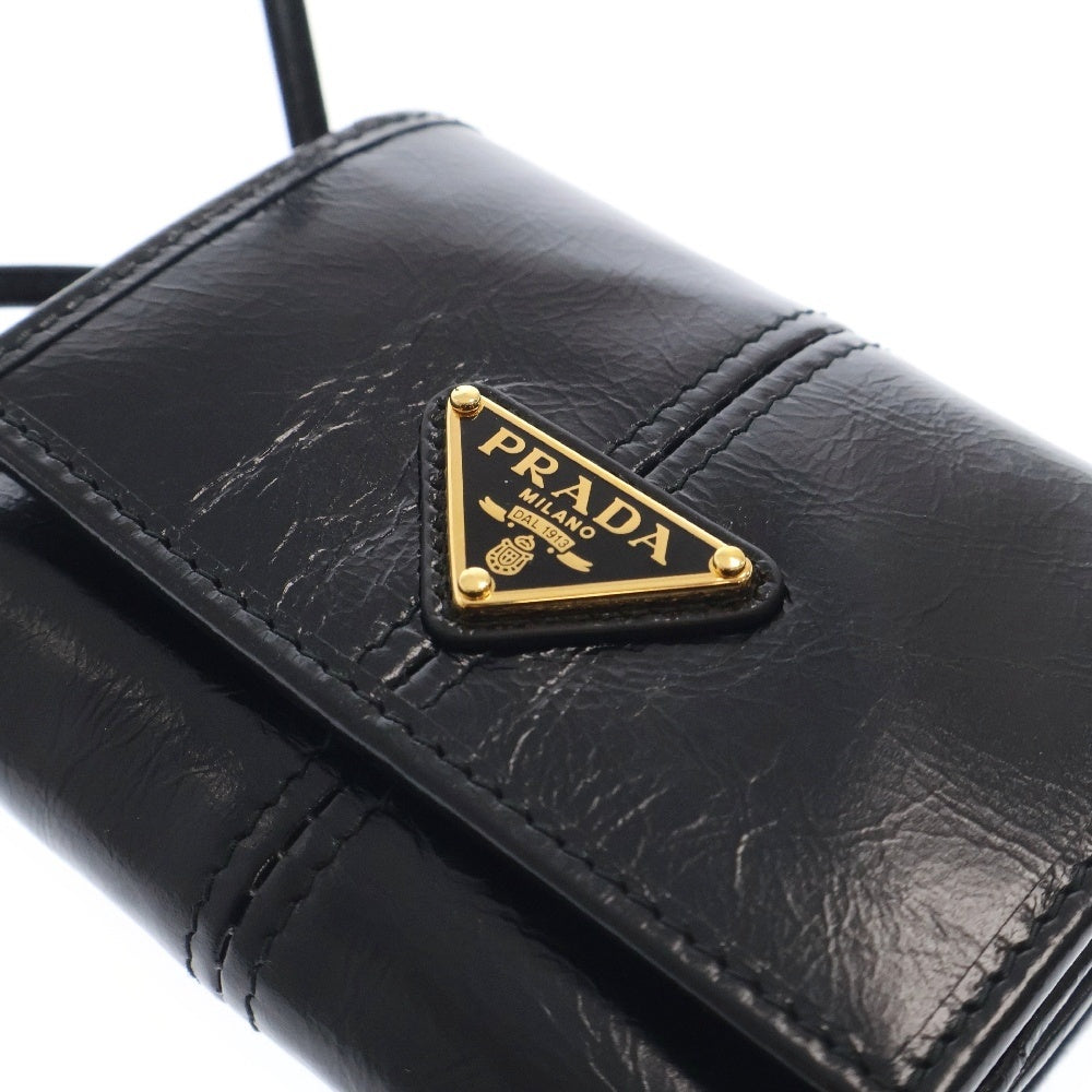 PRADA(プラダ) ソフトルックス ロゴトライアングルプレート コンパクトウォレット ブラック 三つ折り財布