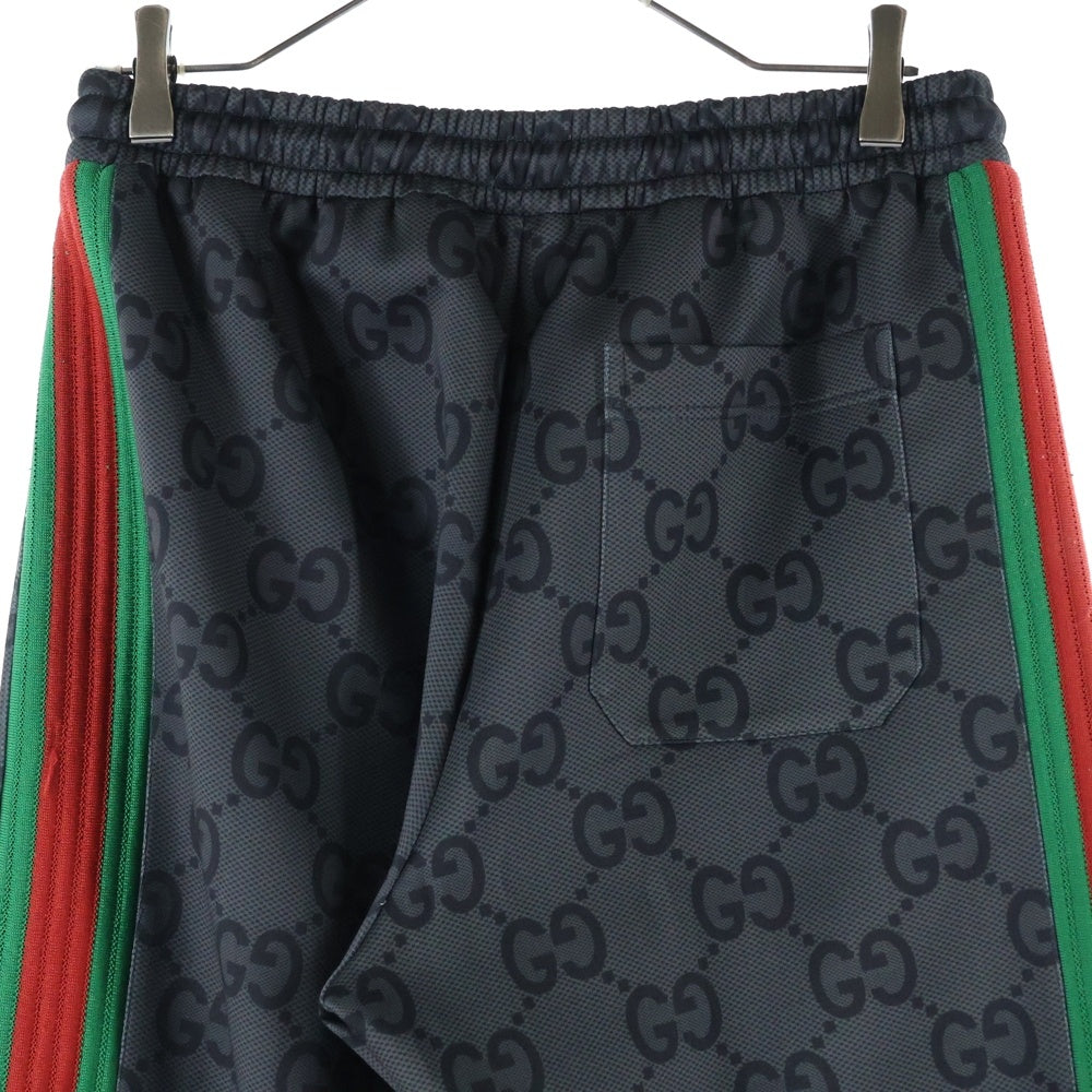 GUCCI(グッチ) ジャンボGG 総柄プリント ウェブストライプ シェリーライン スウェット トラック ジョガー ジョギングパンツ ブラック 715192
