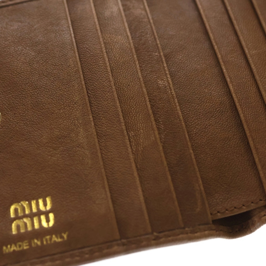miumiu(ミュウミュウ) エンボスロゴ 二つ折り長財布 ブラウン 5ML024 レディース