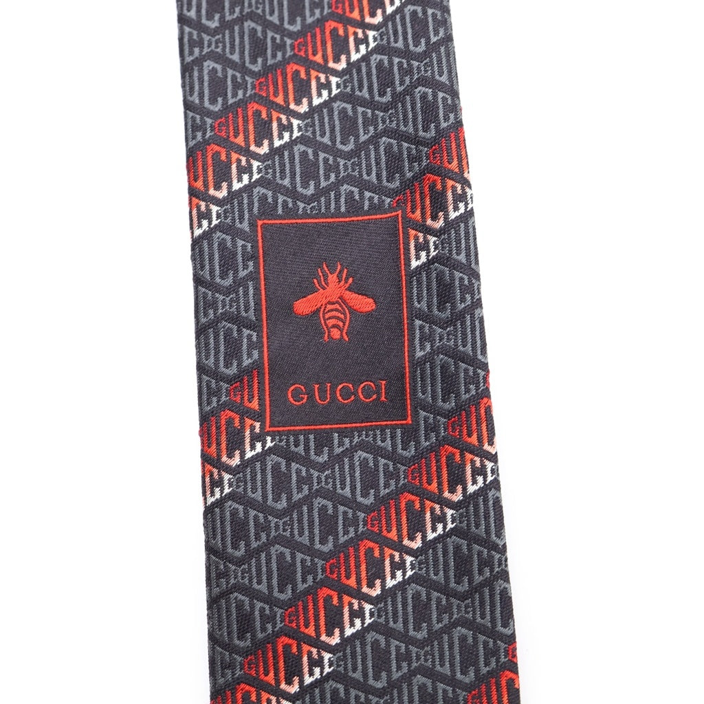 GUCCI(グッチ) ロゴ 総柄 ストライプ シルク ネクタイ ブラック/レッド