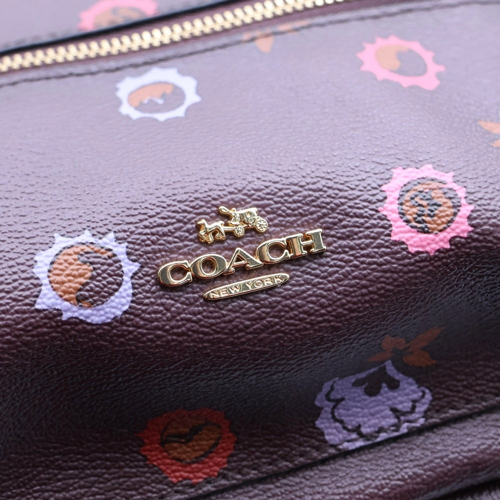COACH(コーチ) ロゴ フラワープリント レザーバックパック リュック ブラウン レディース