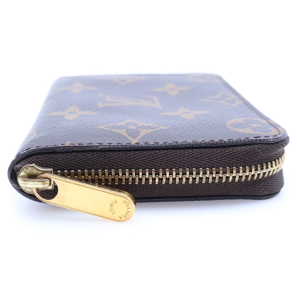 LOUIS VUITTON(ルイヴィトン) モノグラム ジッピーコインパース ブラウン PVC M60067 レディース