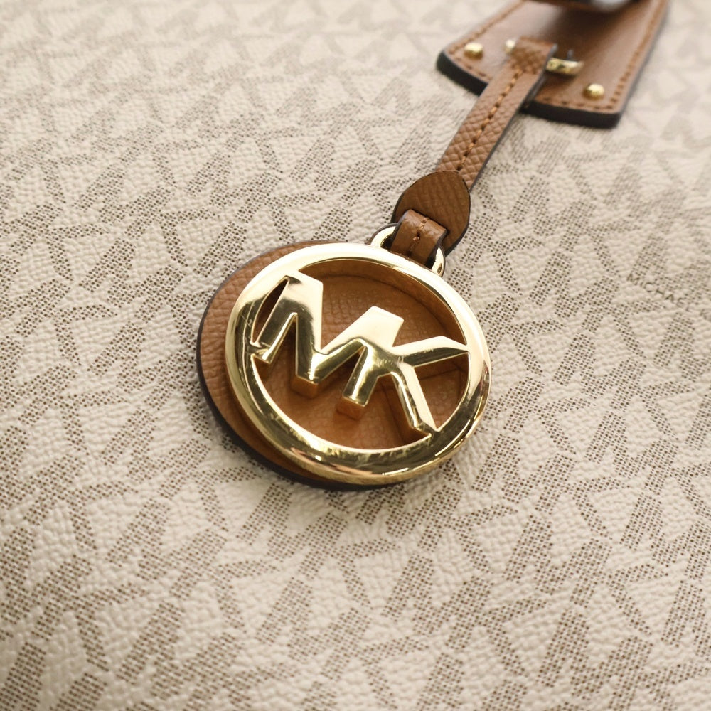 MICHAEL KORS(マイケルコース) MK柄 切り替え ロゴプレート PVC トートバッグ ゴールド金具 ブラウン