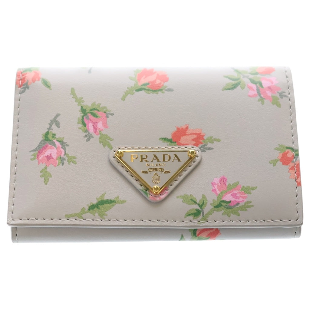 PRADA(プラダ) サフィアーノ トライアングルロゴ カードケース コンパクトウォレット 二つ折り財布 フラワーモチーフ スカイブルー レザー 1MC110 レディース
