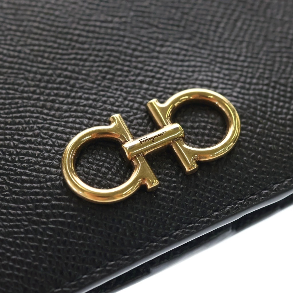FERRAGAMO(フェラガモ) ガンチーニ レザー カードウォレット 二つ折り長財布 小銭入れ付き ブラック 22D779 レディース