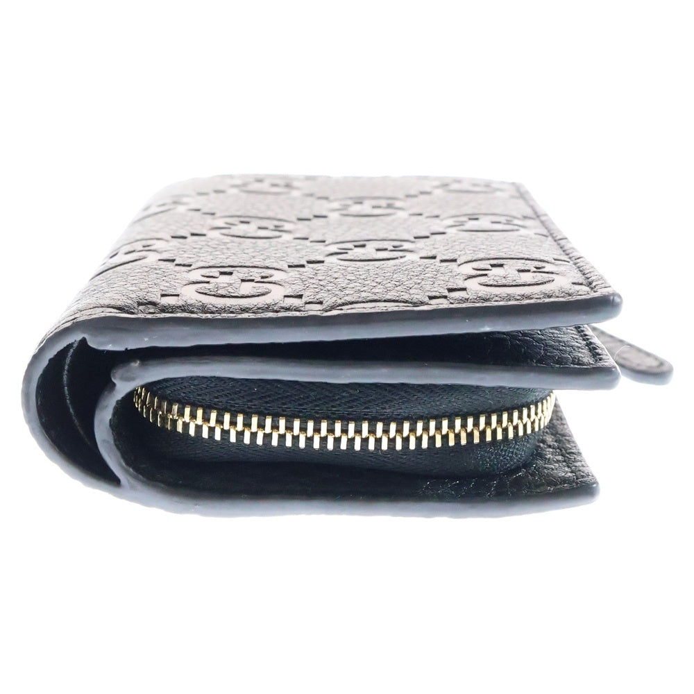 GUCCI(グッチ) GGエンブレム スモールウォレット コンパクトウォレット 二つ折り財布 ブラック ゴールド金具 レザー 815874