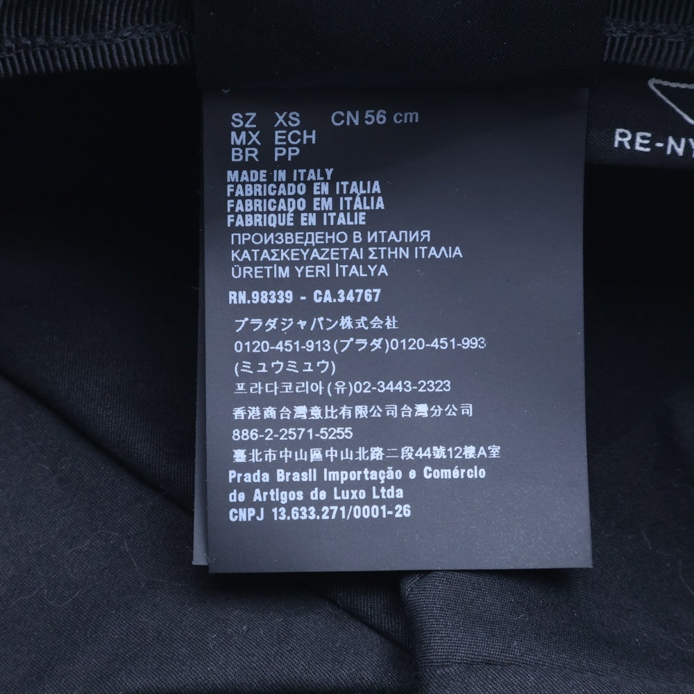 PRADA(プラダ) ロゴ三角プレート ナイロン テスート キャスケット 帽子 ブラック 1HC551