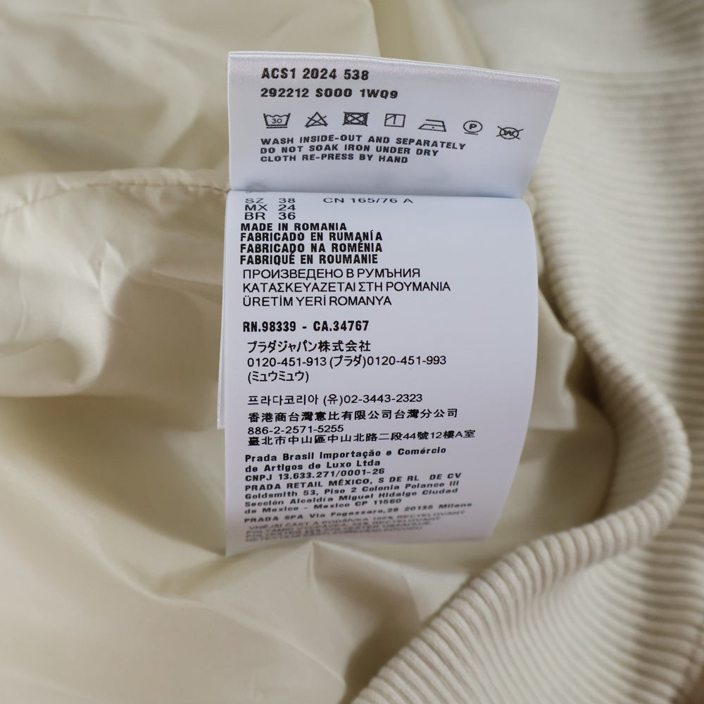 PRADA(プラダ) 24AW RE-NYLON リナイロン トライアングルロゴプレート フーデッド ジップアップ 中綿ジャケット ブルゾン アイボリー/ホワイト 292212