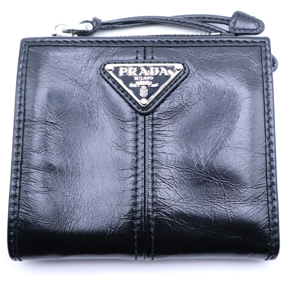 PRADA(プラダ) 二つ折り財布 コンパクトウォレット コインケース 財布 ブラック ソフトルックスレザー 2ML049 シルバー金具