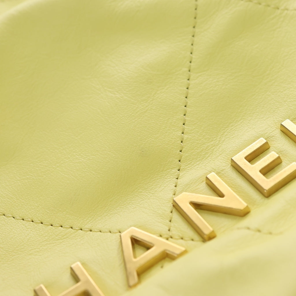 CHANEL(シャネル) シャネル22ミニ シャイニーカーフスキン チェーンショルダーバッグ イエロー ゴールド金具 プレート レディース