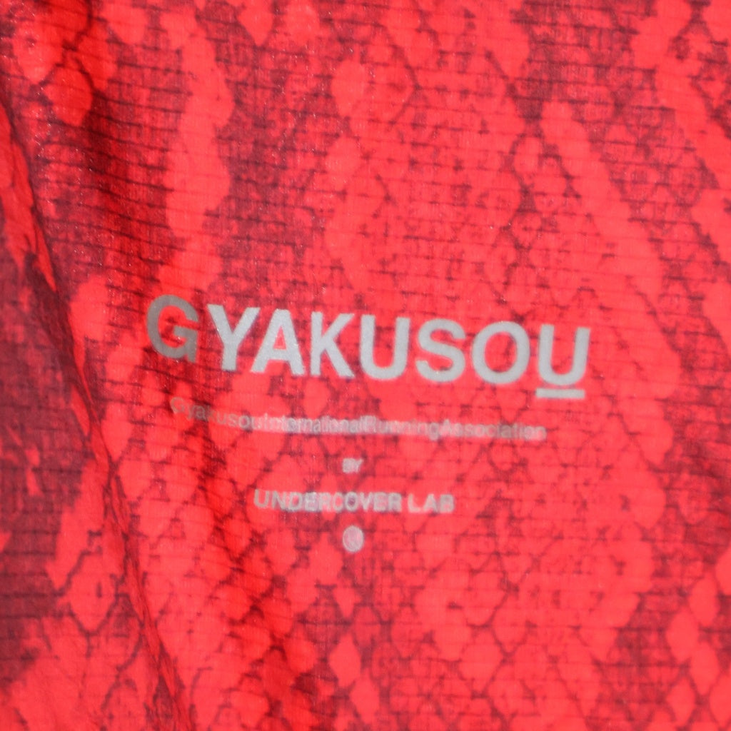 NIKE(ナイキ) ×UNDERCOVER GYAKUSOU ノースリーブランニングジャケット パイソン柄 レッド 632591-670