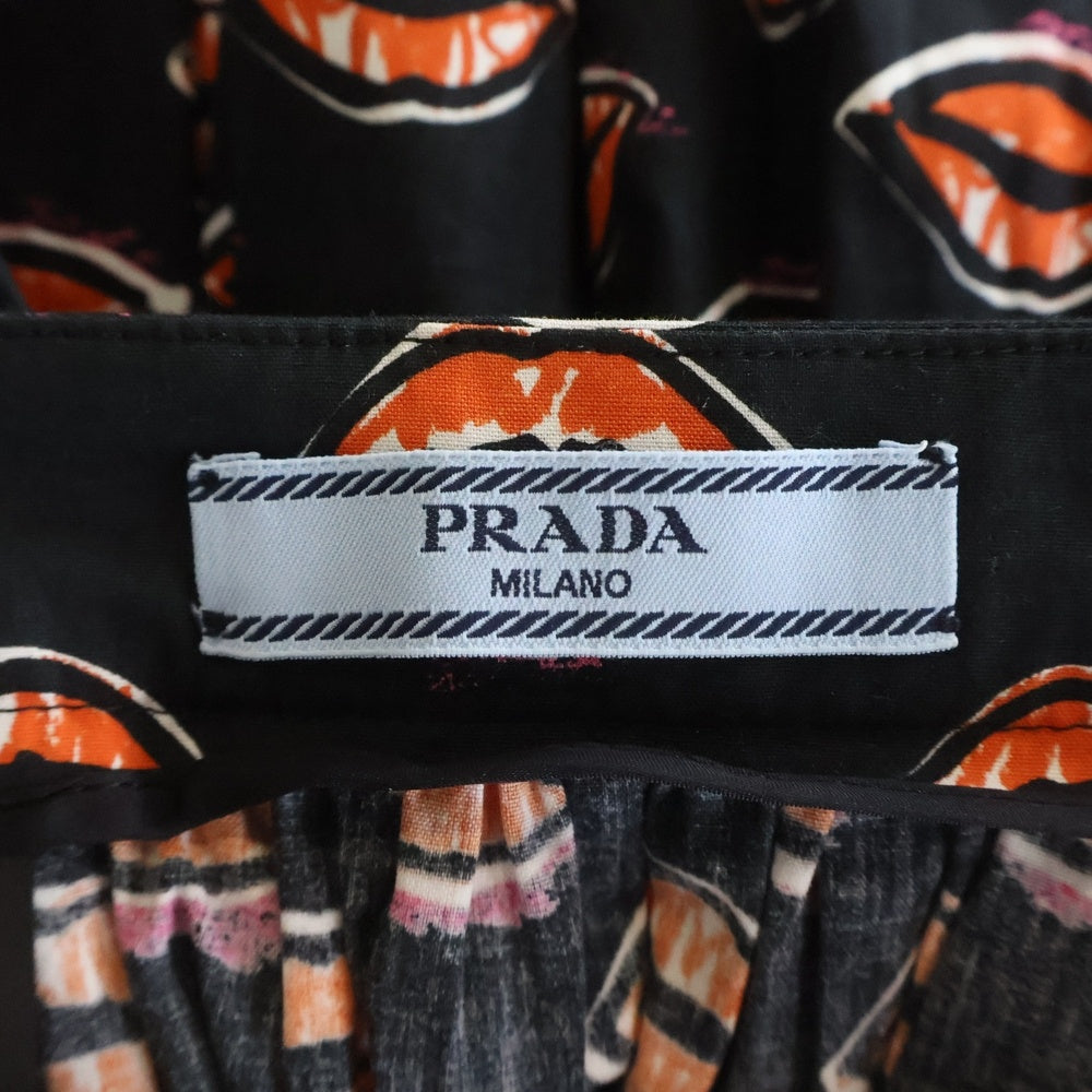 PRADA(プラダ) 総柄 リッププリント ギャザー タイトスカート レディース ブラック/オレンジ