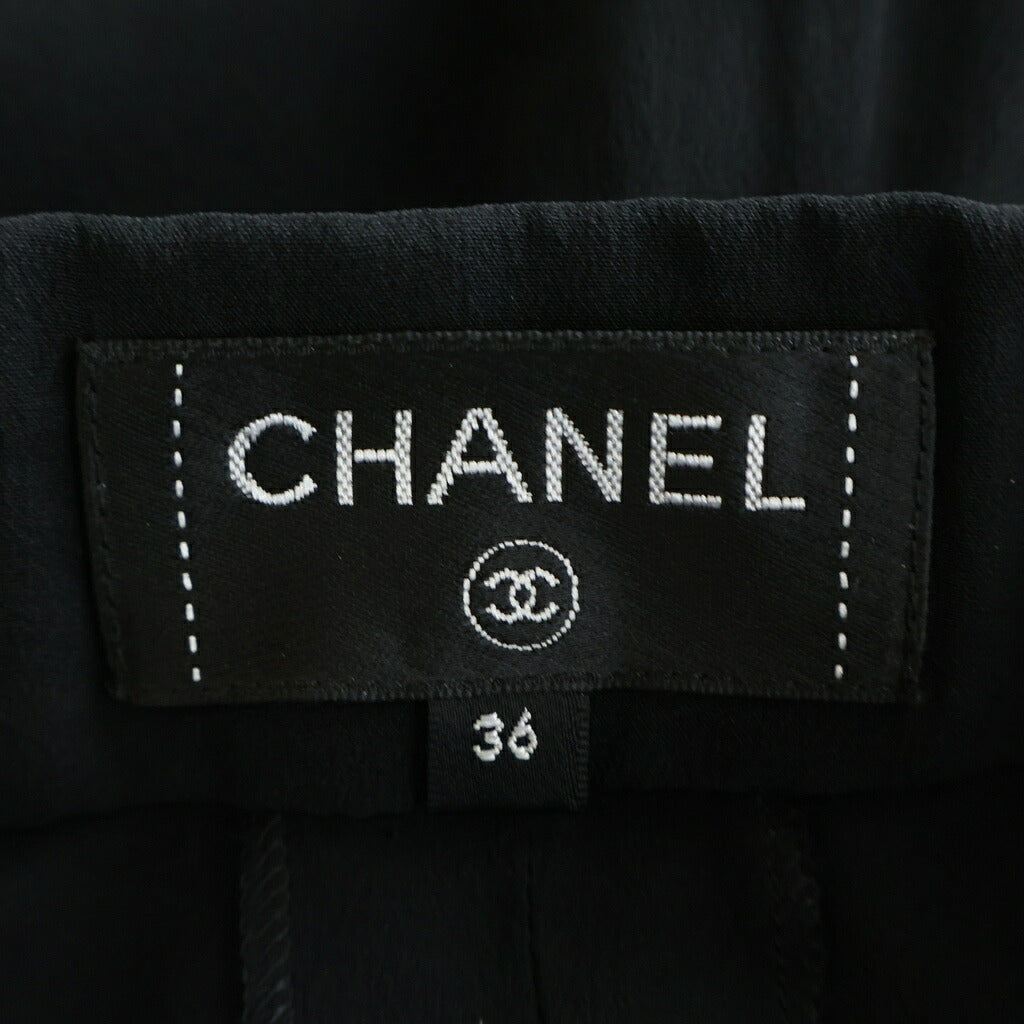 CHANEL(シャネル) Capri Side Ruffle Pants ラインストーン ココマークボタン カプリ サイドラッフル シルク フレアパンツ レディース ブラック P70020V12320