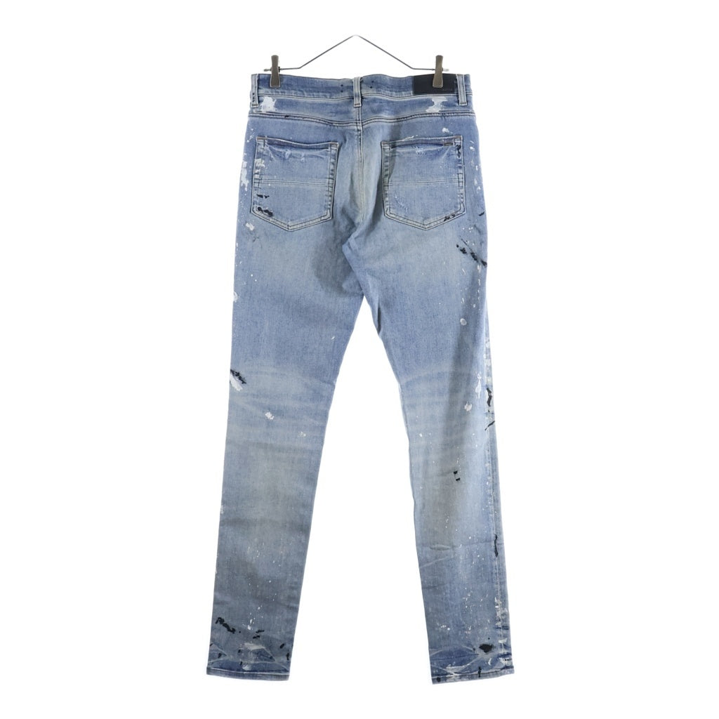 AMIRI(アミリ) ダメージ ペイント加工 ボタンフライ スキニーデニムパンツ インディゴ