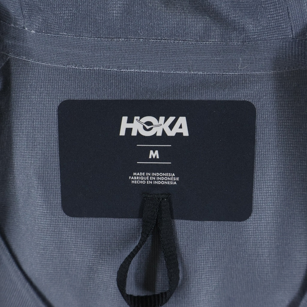 HOKA ONE ONE(ホカオネオネ) トランスポートジャケット ジップアップナイロンジャケット 1170250 ブラック