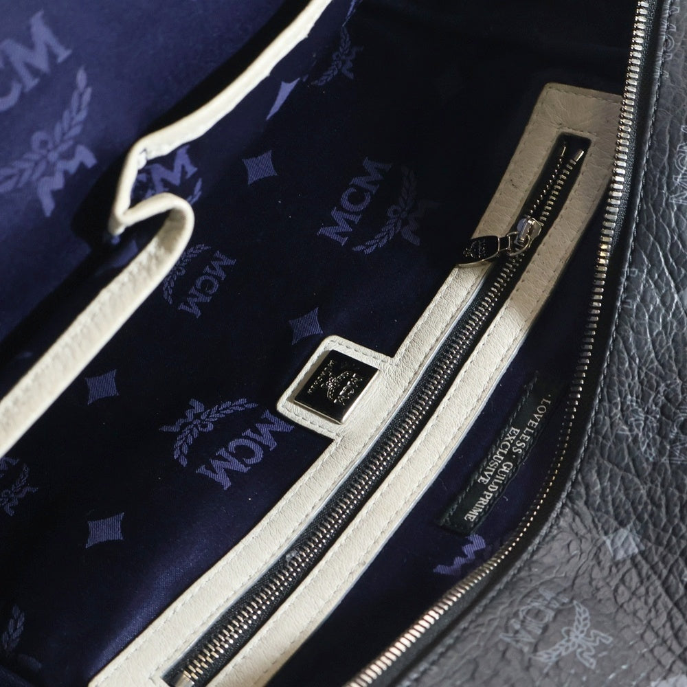 MCM(エム シー エム) LOVELESSコラボ スタッズ バックパック リュックサック ブラック×ホワイト シルバー金具 レザー