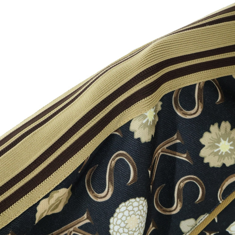 GUCCI(グッチ) Ken Scott フラワー総柄プリント インターロッキングGワッペンロゴ サイドライン ジップアップ トラックジャケット ベージュ/ブラック 645217