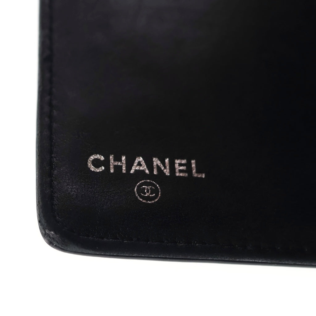 CHANEL(シャネル) 二つ折り長財布 カメリア アイコン ロングウォレット ブラック エナメルレザー シールあり 12番台 レディース