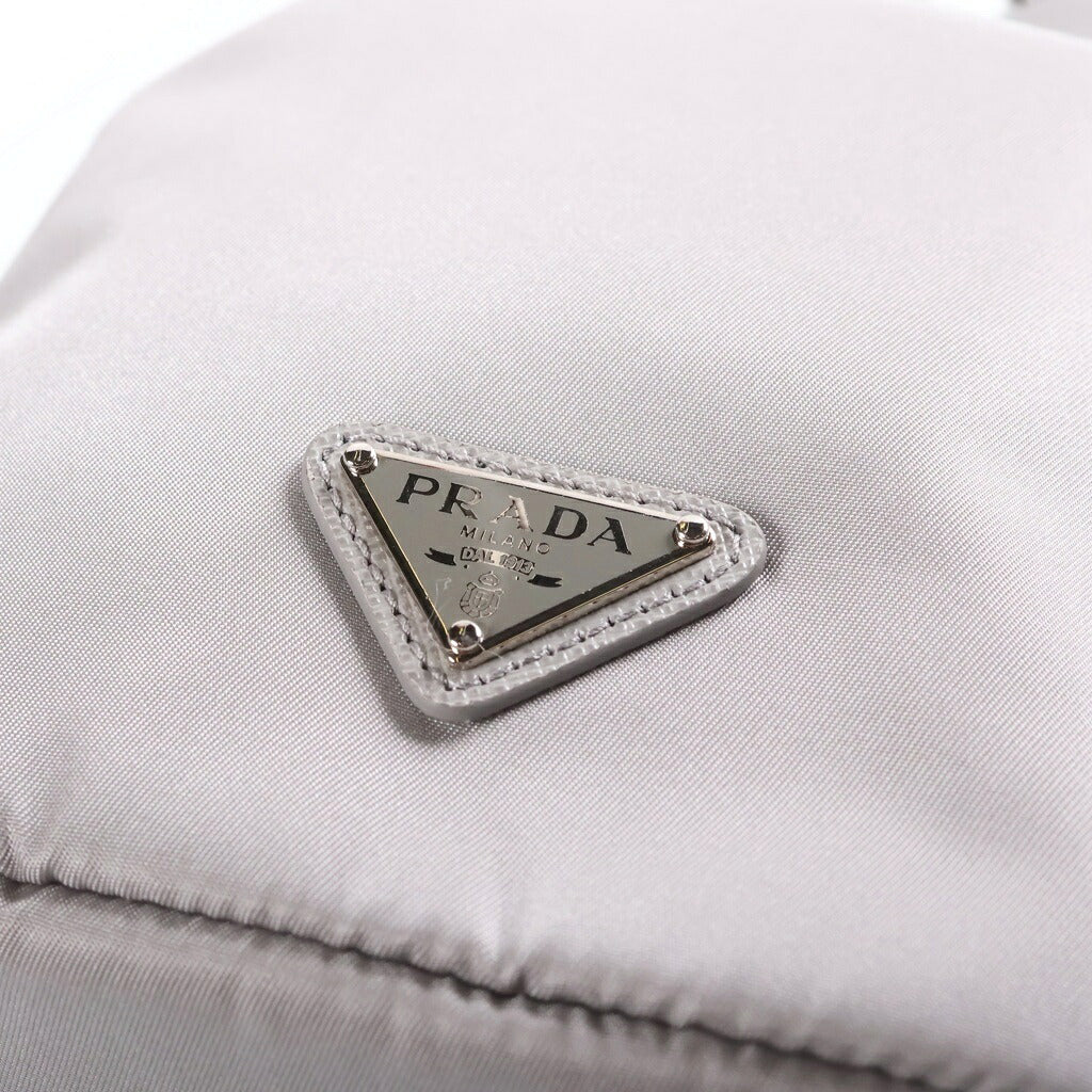 PRADA(プラダ) Re-Nylon ポーチ トライアングルロゴ 巾着型 ハンドバッグ ナイロン グレー 1NS369