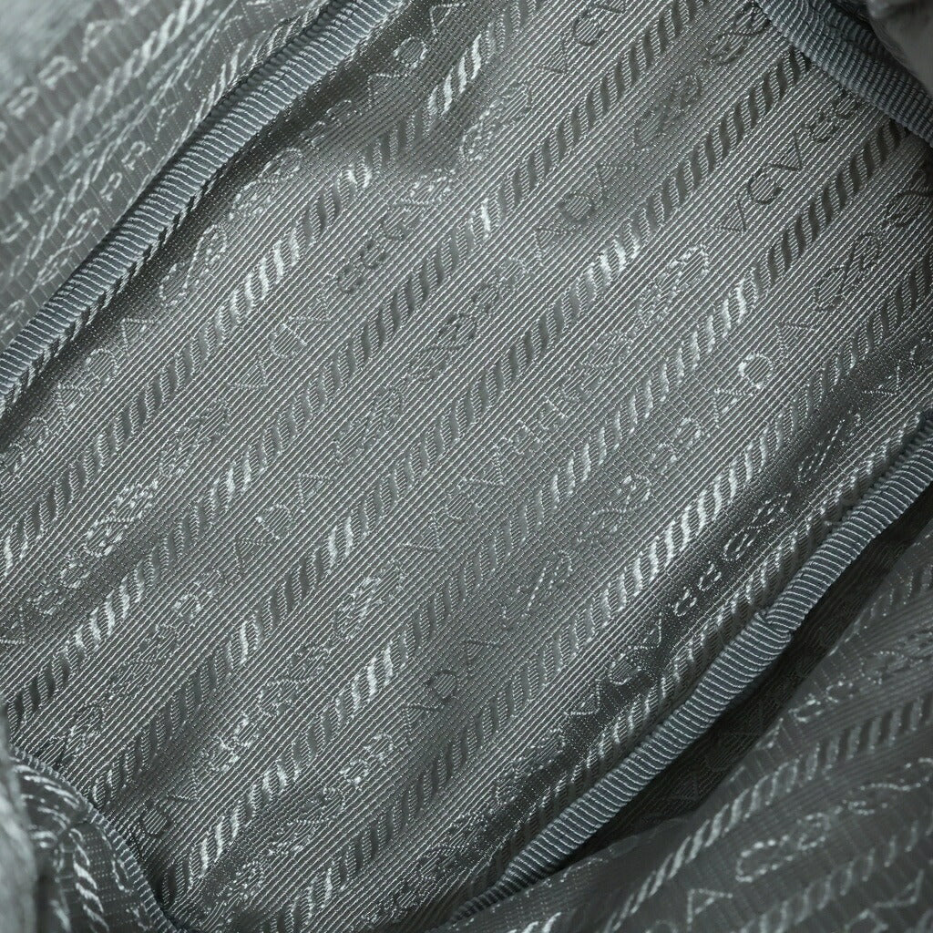 PRADA(プラダ) Re-Nylon ポーチ トライアングルロゴ 巾着型 ハンドバッグ ナイロン グレー 1NS369