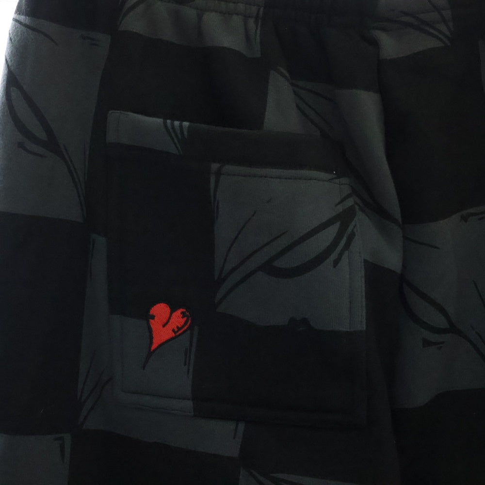 ANTI PROMO(アンチプロモ) 99EYES SWATPANTS MATTY BOY プリントスウェットロングパンツ ブラック