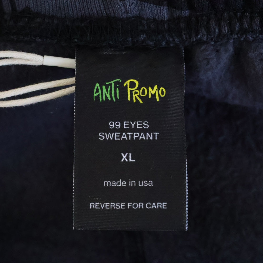 ANTI PROMO(アンチプロモ) 99EYES SWATPANTS MATTY BOY プリントスウェットロングパンツ ブラック