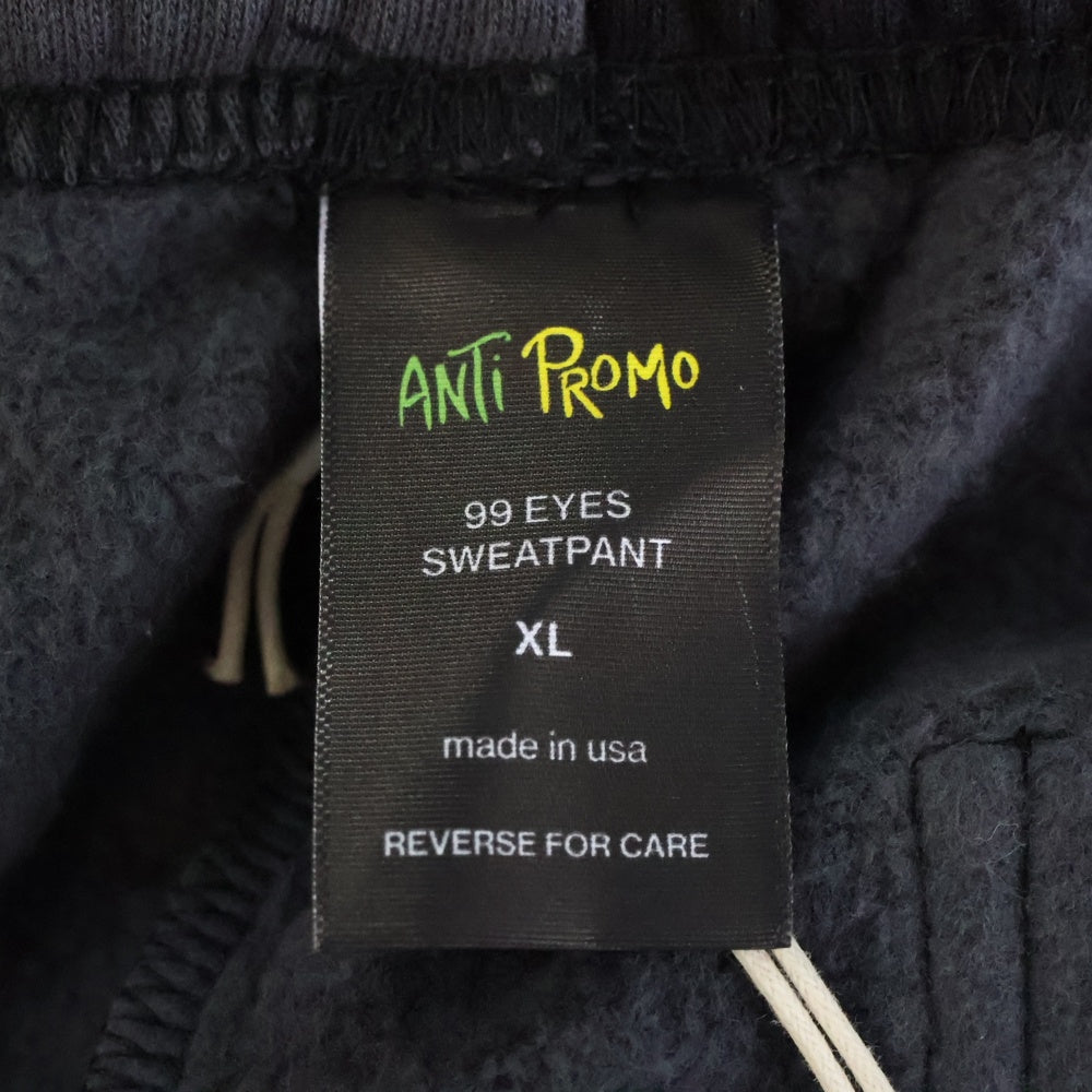 ANTI PROMO(アンチプロモ) 99EYES SWATPANTS MATTY BOY プリントスウェットロングパンツ ブラック