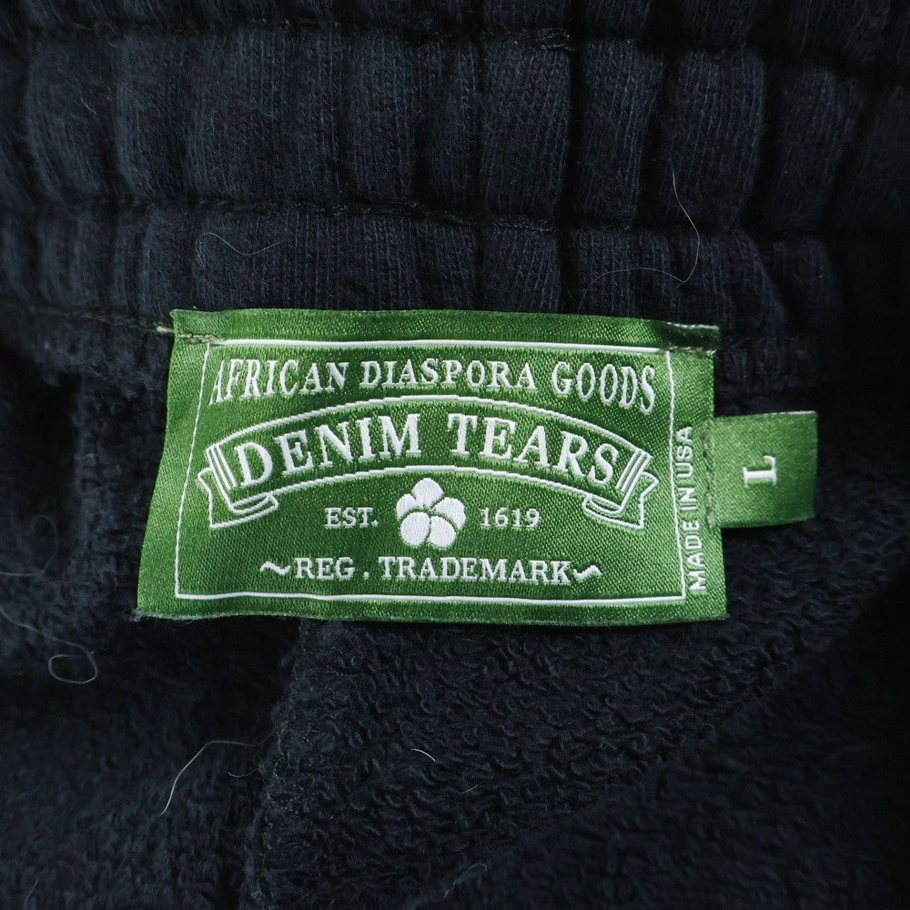 DENIM TEARS(デニムティアーズ) COTTON PEACE SWEAT PANTS コットンピースロゴスウェットパンツ ブラック