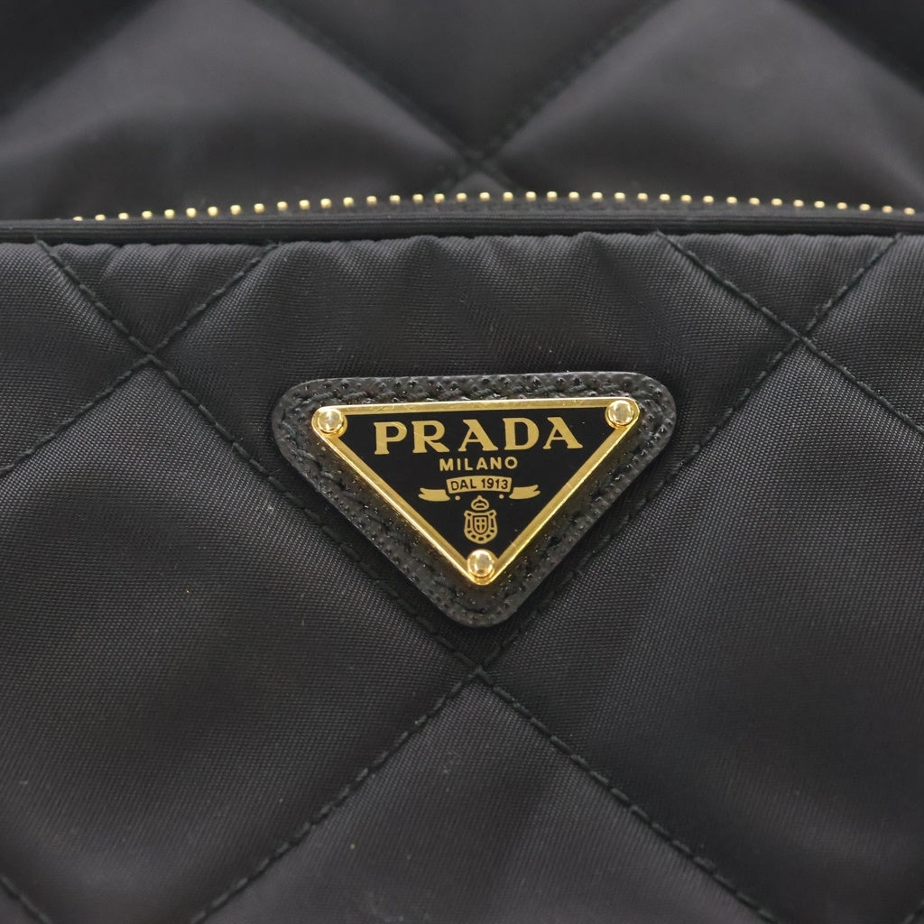 PRADA(プラダ) デュエット Re-Nylon バケットバッグ ショルダーバッグ 巾着バッグ ブラック ナイロン ゴールド金具 レディース