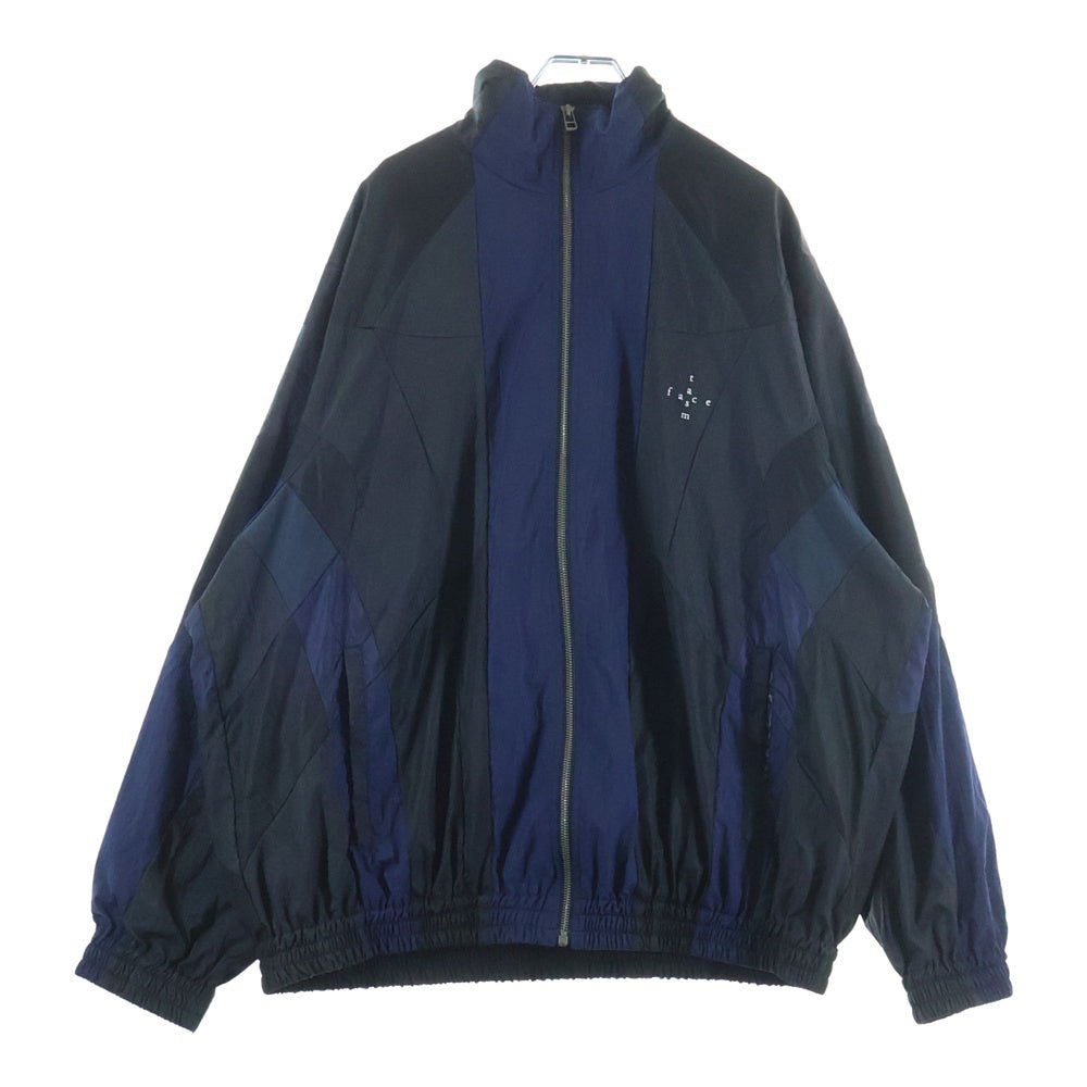 FACETASM(ファセッタズム) 23SS NYLON PATCHWORK JACKET パッチワーク フロントロゴ刺繍 ジップアップ ナイロンジャケット ブラック/ネイビー MKS-JK-M09