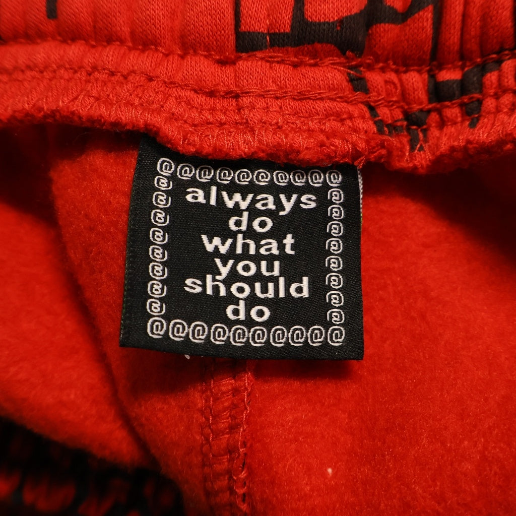 always do what you should do(オールウェイズドゥ ワットユーシュドドゥ) スパイダー 総柄 イージー スウェット パンツ レッド