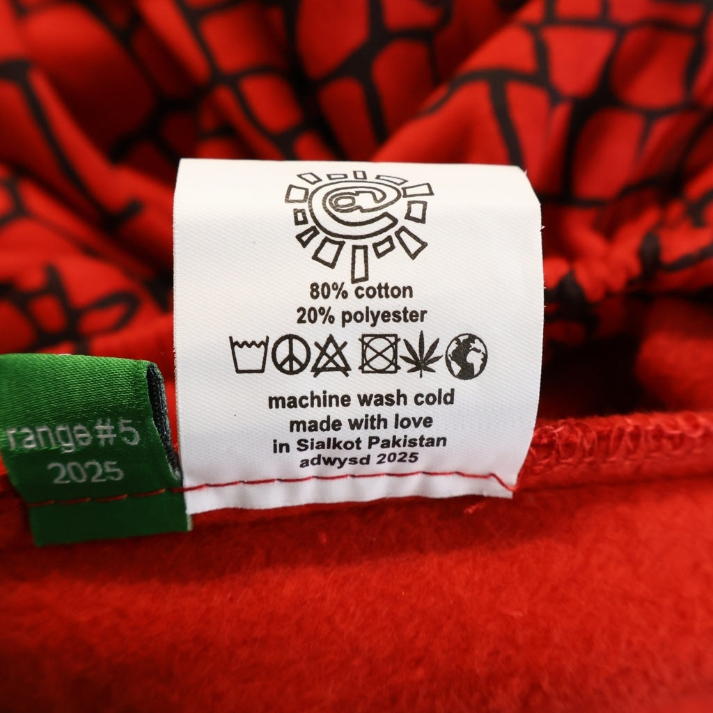 always do what you should do(オールウェイズドゥ ワットユーシュドドゥ) スパイダー 総柄 イージー スウェット パンツ レッド