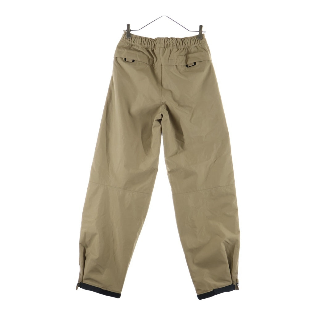 STUSSY(ステューシー) ×NIKE Utility Pant Pine Nut ロゴ 刺繍 ナイロン サイド ライン ジップ パンツ ベージュ