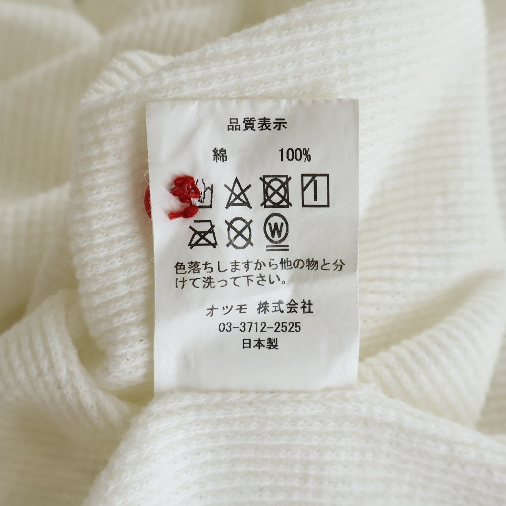 HUMAN MADE(ヒューマンメイド) バックプリント ハートボタン ヘンリーネック 長袖カットソー ホワイト