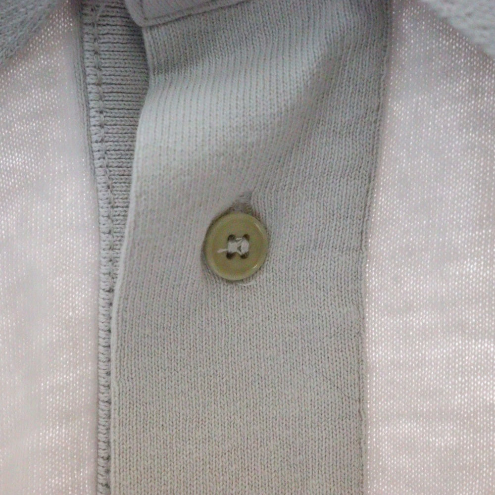 Acne Studios(アクネ ストゥディオズ) 3ボタン エンボスロゴ 長袖ポロシャツ FN-UX-TSHI000015 ホワイト