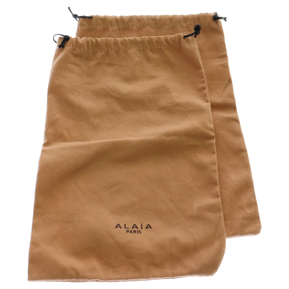 ALAIA(アライア) レーザーカットアンクルストラップサンダル ウエッジソール ブラウン レディース