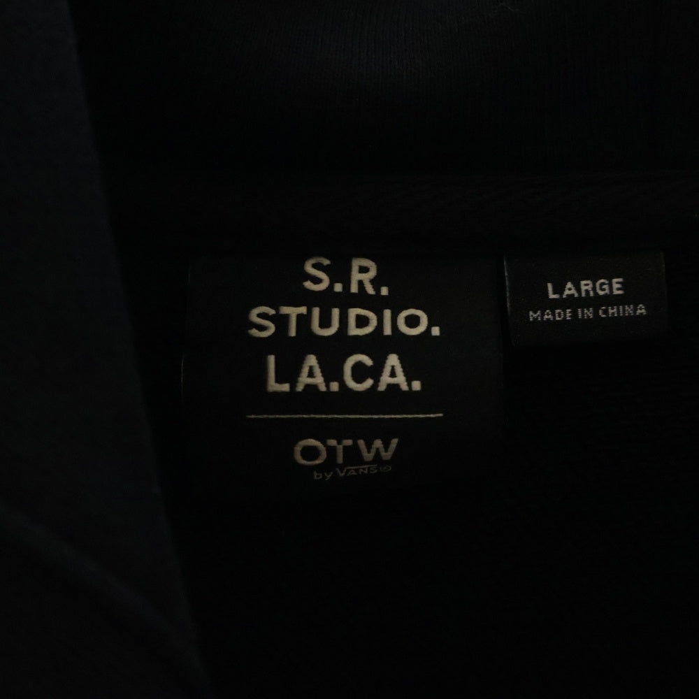 S.R. STUDIO. LA. CA.(エスアールスタジオエルエーシーエー) ×OTW BY VANS STERLING RUBY HOODIE OTWバイヴァンズ 両面プリント プルオーバースウェットパーカー フーディー ブラック VN000MZFBLK