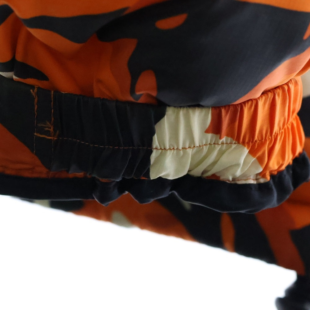 THE NORTH FACE(ザノースフェイス) NOVELTY NUPTSE JACKET ノベルティー ヌプシ ジャケット カモフラ 総柄 ダウン ブルゾン オレンジ ND91842