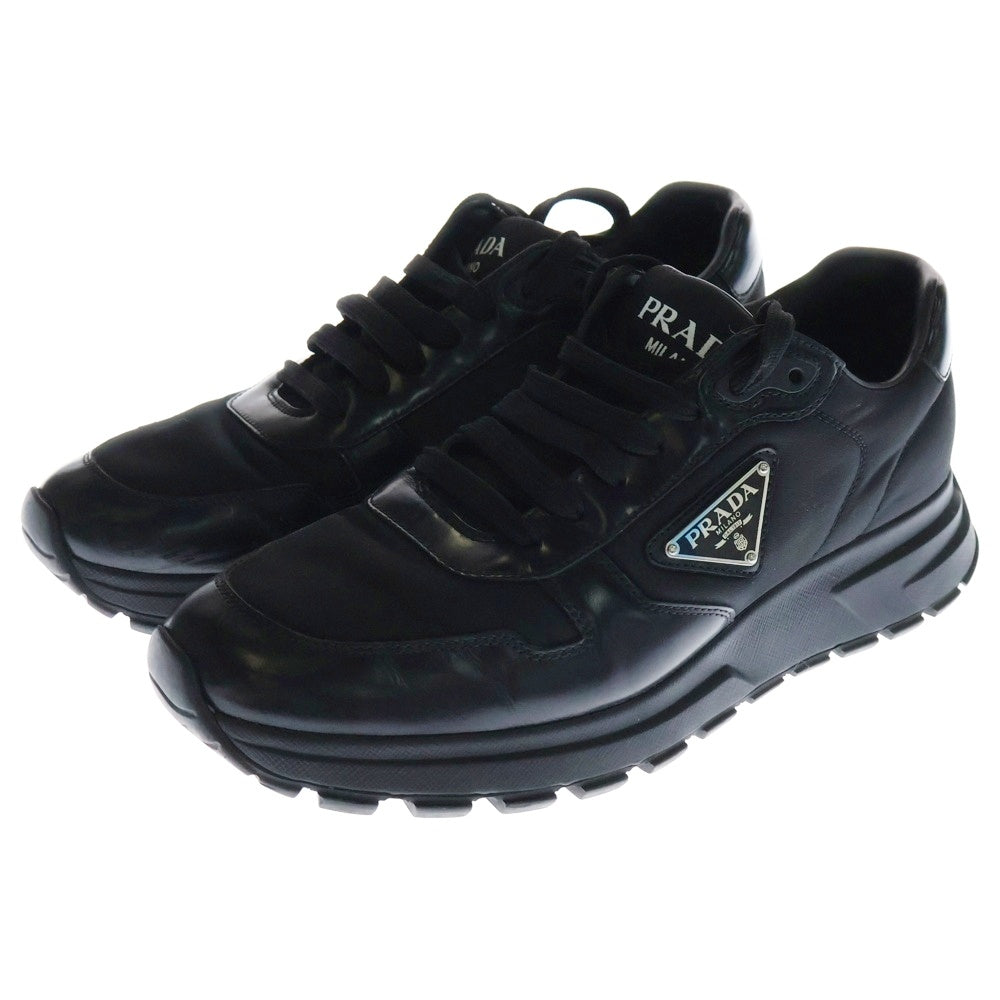 PRADA(プラダ) PRAX 01 Re-Nylon ブラッシュドレザー ローカットスニーカー ブラック 2EE369