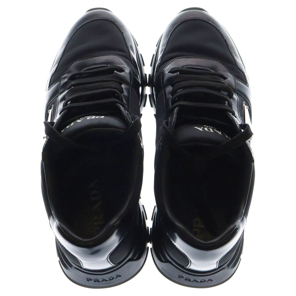 PRADA(プラダ) PRAX 01 Re-Nylon ブラッシュドレザー ローカットスニーカー ブラック 2EE369