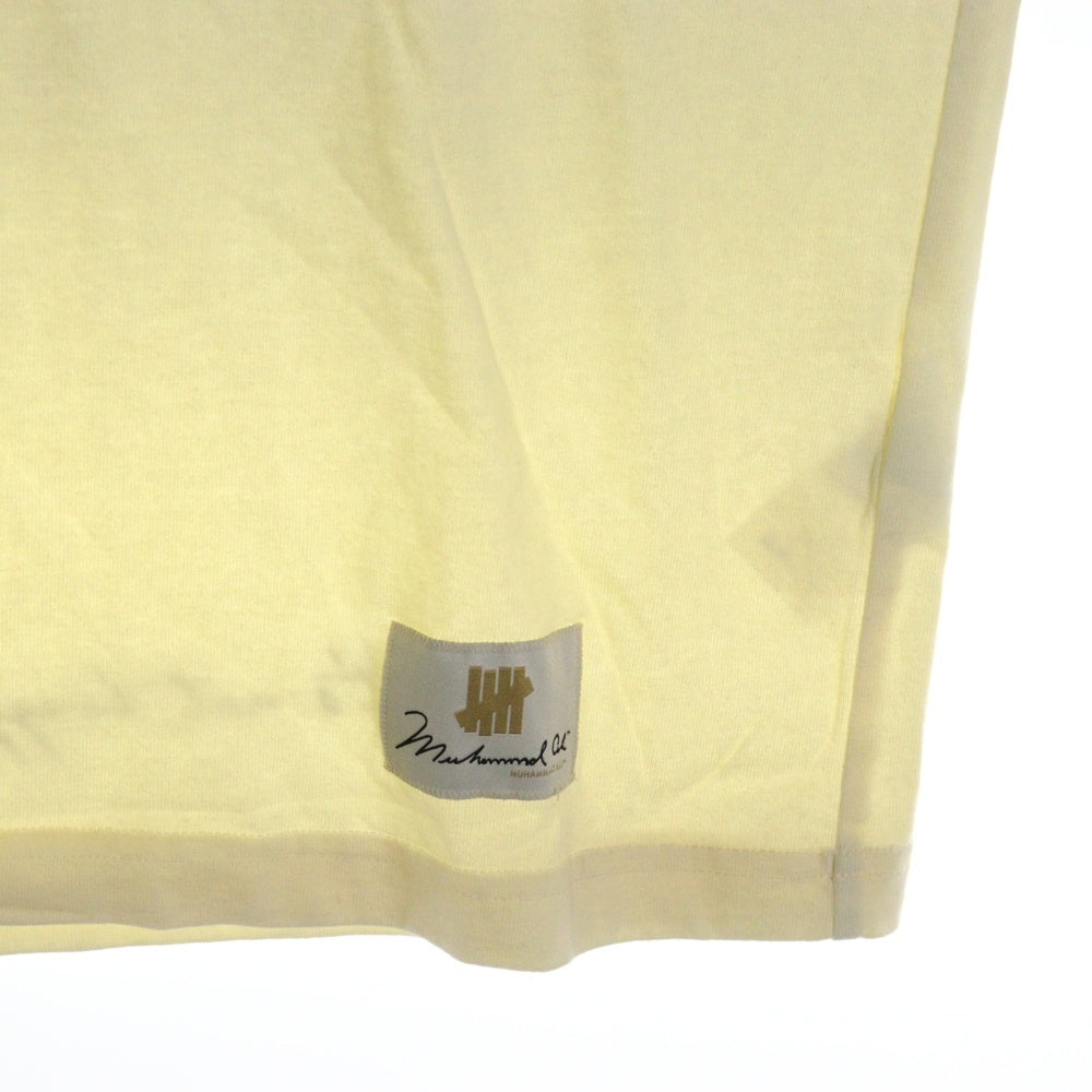 UNDEFEATED(アンディフィーテッド) 24SS ×MUHAMMAD ALI モハメド アリ クルーネック半袖プリントTシャツ カットソー アイボリー UC42GSS14M