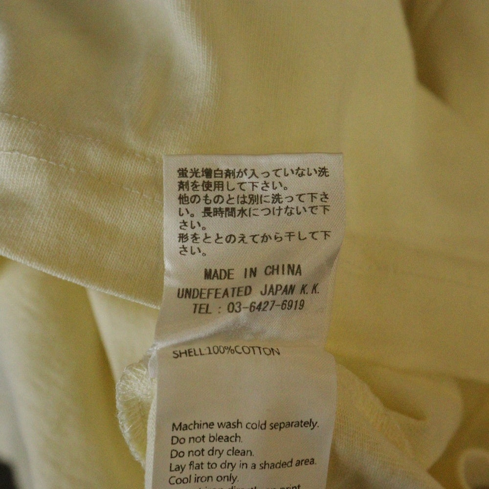 UNDEFEATED(アンディフィーテッド) 24SS ×MUHAMMAD ALI モハメド アリ クルーネック半袖プリントTシャツ カットソー アイボリー UC42GSS14M