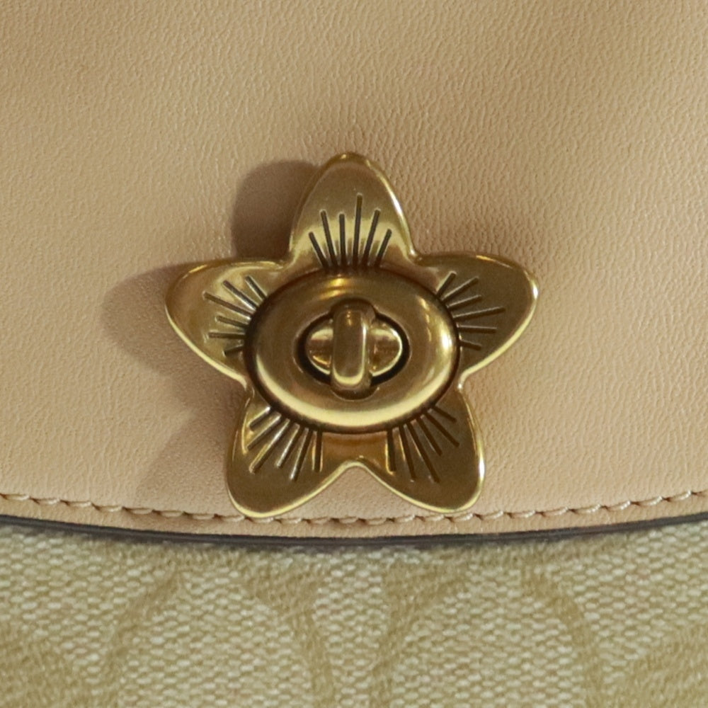 COACH(コーチ) シグネチャー切替 フラワー ターンロック クラッチ バッグ ベージュ レディース A1977-F72997